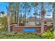 Brick entrance sign of Gardenia Glen community at 9323 Bella Vita Cir, Land O Lakes, FL 34637