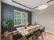 Modern dining room with large windows and stylish decor at 9323 Bella Vita Cir, Land O Lakes, FL 34637