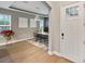 Bright dining room with hardwood floors and modern decor at 9323 Bella Vita Cir, Land O Lakes, FL 34637