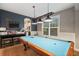 Game room with a pool table and a ping pong table at 9323 Bella Vita Cir, Land O Lakes, FL 34637