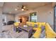Patio with yellow couches and a view of the pool at 9323 Bella Vita Cir, Land O Lakes, FL 34637