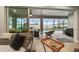 Relaxing screened lanai overlooking a sparkling pool and patio area at 9323 Bella Vita Cir, Land O Lakes, FL 34637
