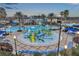 Resort-style pool with water features at 9323 Bella Vita Cir, Land O Lakes, FL 34637
