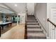 Interior view showing staircase and game room at 9323 Bella Vita Cir, Land O Lakes, FL 34637