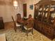 Formal dining room with hutch and wood table at 10185 Horizon Dr, Spring Hill, FL 34608