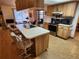 Kitchen boasts an island and stainless steel appliances at 10185 Horizon Dr, Spring Hill, FL 34608