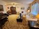 Bright living room featuring a comfy sofa and a large window at 10185 Horizon Dr, Spring Hill, FL 34608