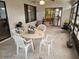 Enclosed sunroom with seating area and view of backyard at 10185 Horizon Dr, Spring Hill, FL 34608