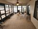Bright sunroom with table and chairs, perfect for relaxing at 10185 Horizon Dr, Spring Hill, FL 34608