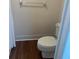 Simple toilet and shower in a small bathroom at 108 Lakeside Dr, Oldsmar, FL 34677