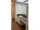 Bathroom with granite countertop and updated vanity at 108 Lakeside Dr, Oldsmar, FL 34677