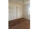 Bright bedroom with double closets and carpet flooring at 108 Lakeside Dr, Oldsmar, FL 34677
