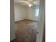 Spacious carpeted bedroom with ceiling fan and window at 108 Lakeside Dr, Oldsmar, FL 34677
