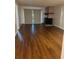 Spacious living room with wood-look flooring and fireplace at 108 Lakeside Dr, Oldsmar, FL 34677