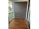 Spacious screened balcony with view of water at 108 Lakeside Dr, Oldsmar, FL 34677