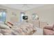 Bedroom with double bed, dresser, and a TV at 11030 Linkside Dr # 11030, Port Richey, FL 34668