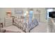 Comfortable bedroom with a double bed and light-colored dresser at 11030 Linkside Dr # 11030, Port Richey, FL 34668