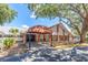 Timber Oaks community clubhouse with covered entrance at 11030 Linkside Dr # 11030, Port Richey, FL 34668