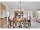 Formal dining room with wood table and chairs, and a hutch at 11030 Linkside Dr # 11030, Port Richey, FL 34668