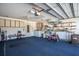 Garage with washer/dryer, shelving, and ample storage at 11030 Linkside Dr # 11030, Port Richey, FL 34668
