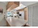 Kitchen with light wood cabinets and a large island at 11030 Linkside Dr # 11030, Port Richey, FL 34668