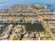 Bird's-eye view of canal-front homes and neighborhood at 13637 Lagoon Dr, Hudson, FL 34667