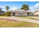 Well-maintained house with a long driveway at 13637 Lagoon Dr, Hudson, FL 34667