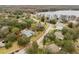 House nestled on a large lot near a lake at 13721 Mill Pl, Odessa, FL 33556