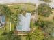 Aerial view showing home's layout, pool, and landscaping at 13721 Mill Pl, Odessa, FL 33556