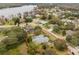 House nestled on a large lot near a lake at 13721 Mill Pl, Odessa, FL 33556