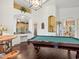Pool table is the centerpiece of this game room at 13721 Mill Pl, Odessa, FL 33556