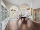 Spacious game room with pool table and hardwood floors at 13721 Mill Pl, Odessa, FL 33556