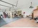 Large garage with workshop area and ample storage at 13721 Mill Pl, Odessa, FL 33556