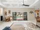 Living area showcasing pool view and high ceilings at 13721 Mill Pl, Odessa, FL 33556