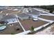 Aerial view showing homes with backyards and above-ground pools at 14506 Whitewater Way, Brooksville, FL 34604