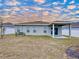 Large backyard with covered patio and fence at 14506 Whitewater Way, Brooksville, FL 34604