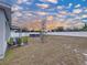 Fenced backyard with a grassy area at 14506 Whitewater Way, Brooksville, FL 34604