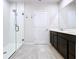 Modern bathroom with double vanity and shower at 14506 Whitewater Way, Brooksville, FL 34604