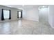 Spacious bedroom with tile floors and neutral decor at 14506 Whitewater Way, Brooksville, FL 34604
