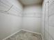 Spacious closet with wire shelving and shoe rack at 14506 Whitewater Way, Brooksville, FL 34604