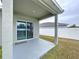 Covered patio with sliding glass doors at 14506 Whitewater Way, Brooksville, FL 34604