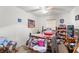 Bedroom with ceiling fan and window, offering a comfortable atmosphere at 4372 Odin St, Spring Hill, FL 34608