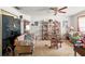 Living room with a large collection of personal items at 4372 Odin St, Spring Hill, FL 34608