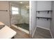 Updated bathroom with a large walk-in shower and pebble floor at 4649 Westerly Dr, New Port Richey, FL 34653