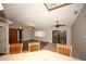 Dining area with wood flooring and access to the kitchen at 4649 Westerly Dr, New Port Richey, FL 34653