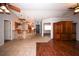 Kitchen with breakfast bar and dark wood cabinets at 4649 Westerly Dr, New Port Richey, FL 34653
