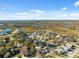 Wide aerial view of waterfront homes and waterways at 5287 Tuna Ln, Weeki Wachee, FL 34607