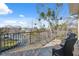 Private balcony overlooking the water with wicker chairs at 5287 Tuna Ln, Weeki Wachee, FL 34607