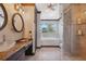 Spa-like bathroom with soaking tub, walk-in shower, and dual sinks at 5287 Tuna Ln, Weeki Wachee, FL 34607