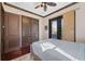 Bedroom with double doors and a view of the pool at 5287 Tuna Ln, Weeki Wachee, FL 34607